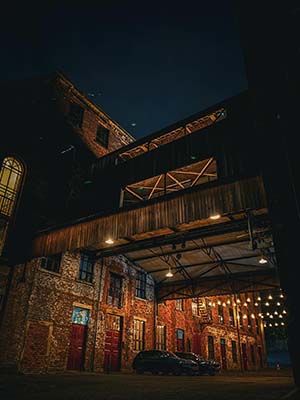 Defiance Distillery exterior at night